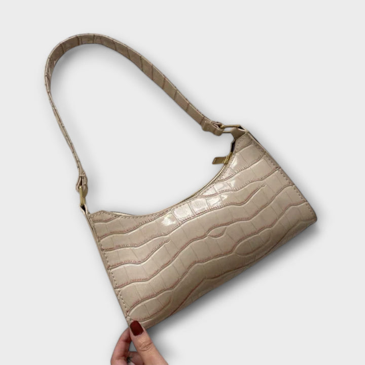 Léora. Glänzende Ledertasche