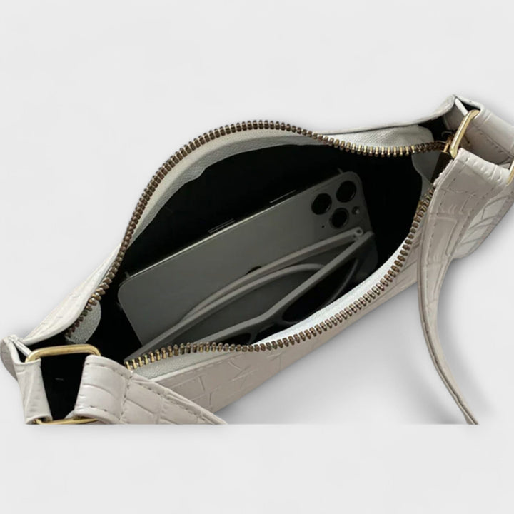 Léora. Glänzende Ledertasche