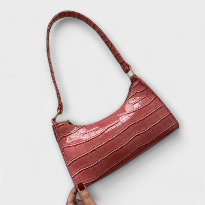 Léora. Glänzende Ledertasche