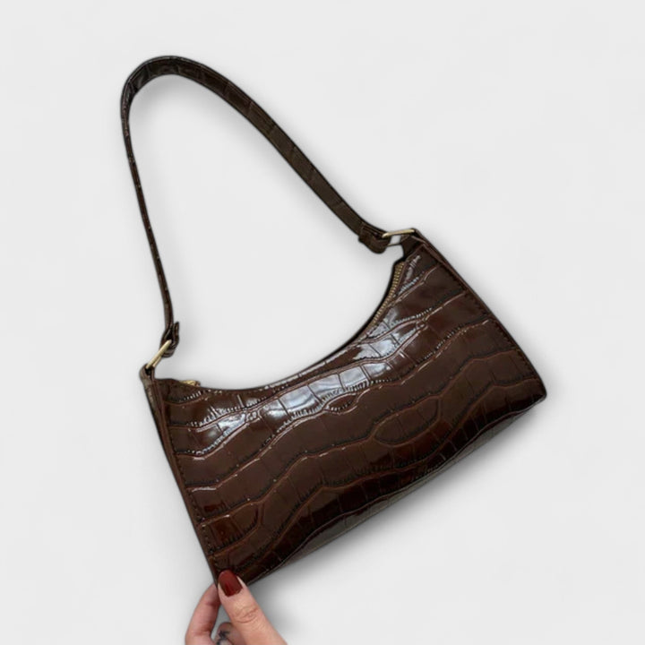 Léora. Glänzende Ledertasche