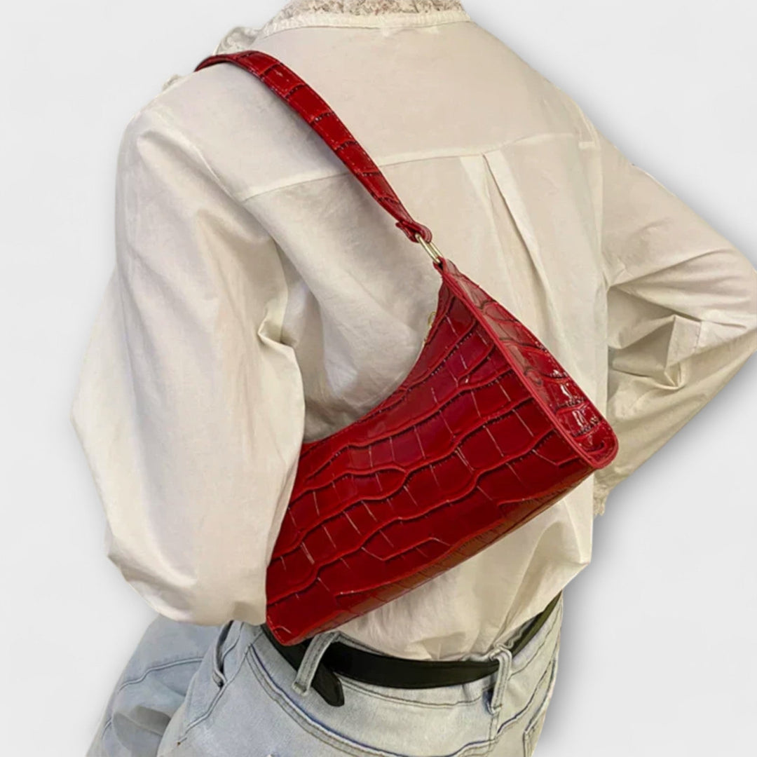 Léora. Glänzende Ledertasche