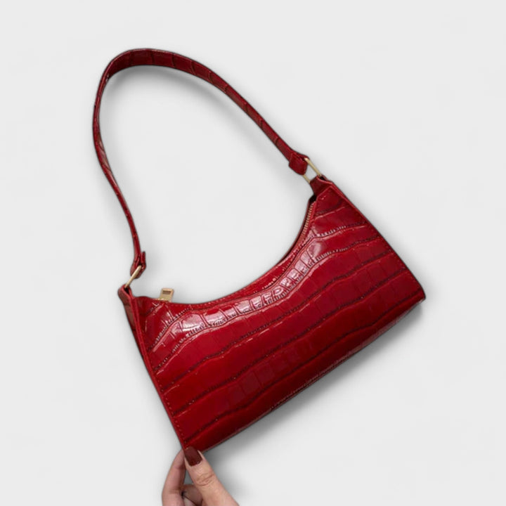 Léora. Glänzende Ledertasche