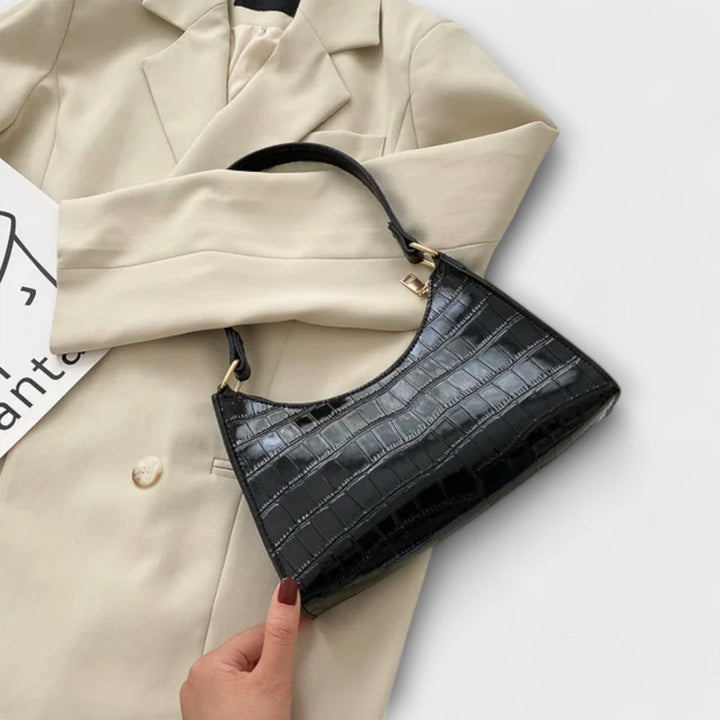 Léora. Glänzende Ledertasche