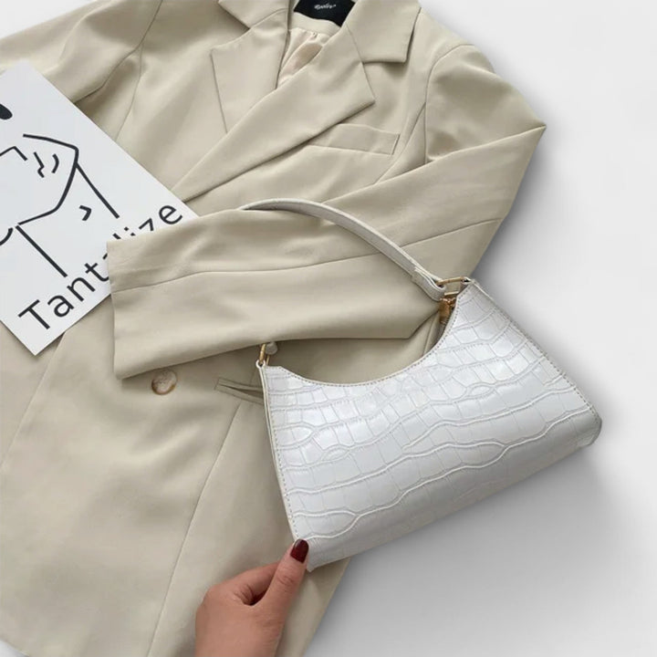 Léora. Glänzende Ledertasche